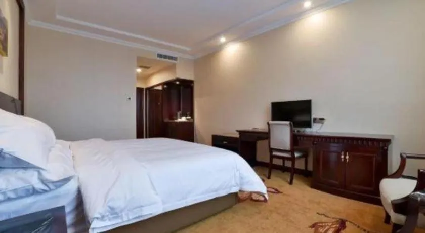 Bed in Vienna Classic Hotel Zhangzhou Longchi Center