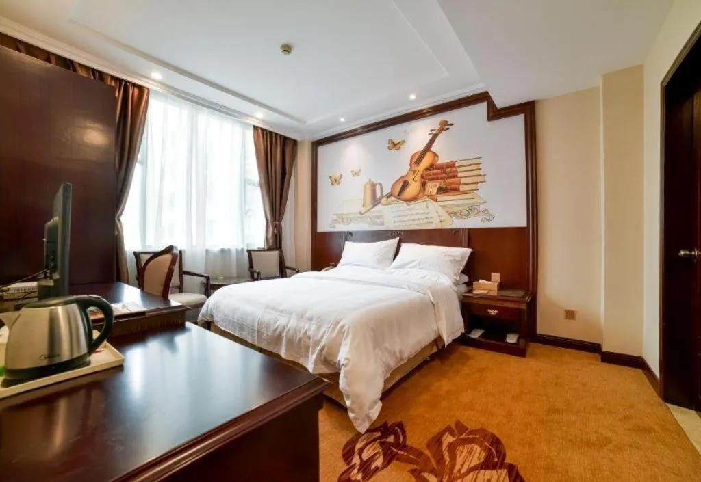 Bed in Vienna Classic Hotel Zhangzhou Longchi Center