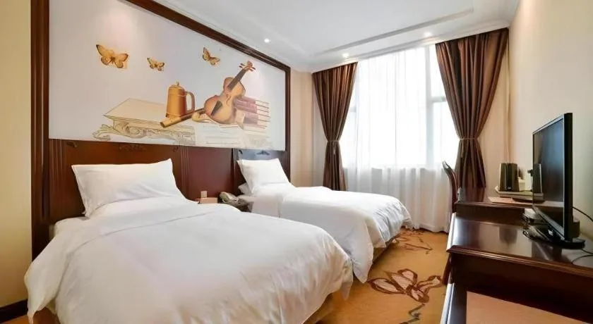 Bed in Vienna Classic Hotel Zhangzhou Longchi Center