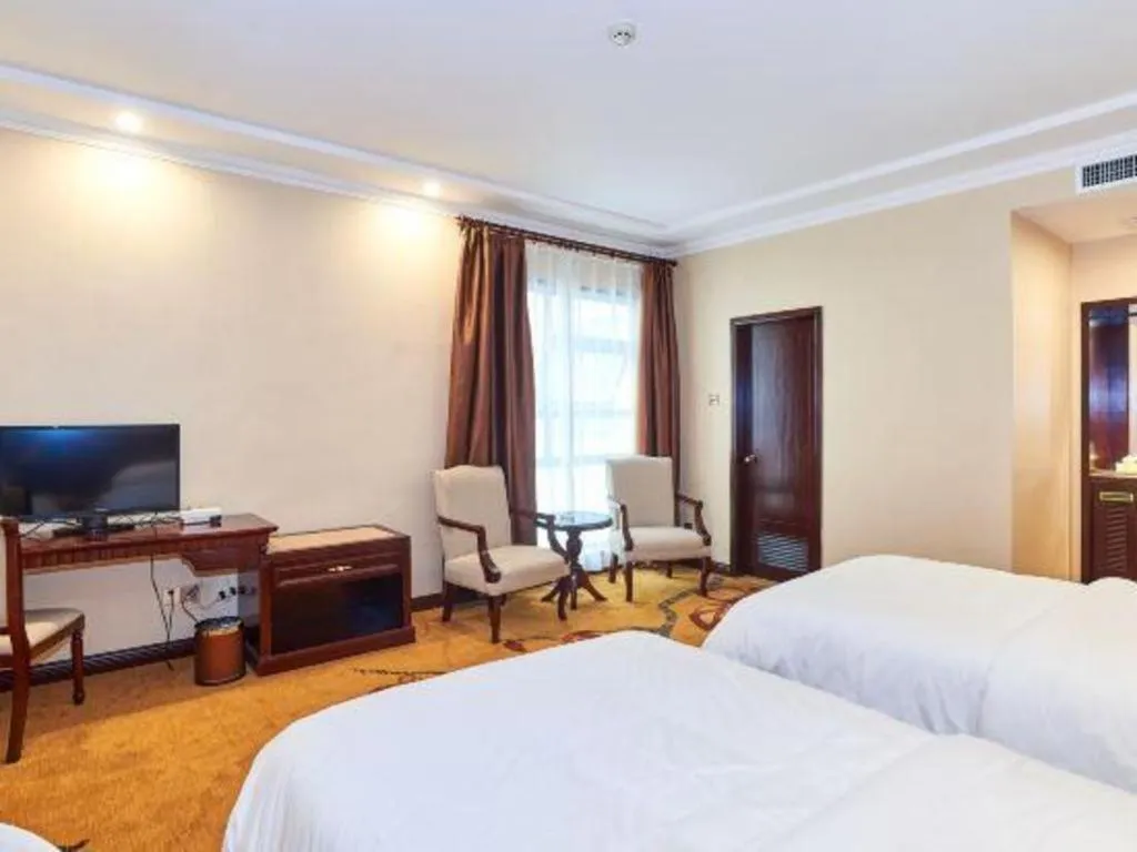 Bed in Vienna Classic Hotel Zhangzhou Longchi Center