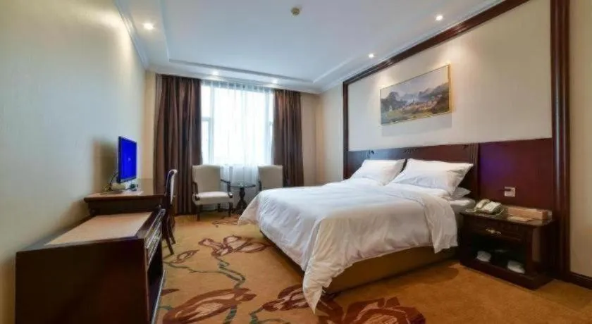 Bed in Vienna Classic Hotel Zhangzhou Longchi Center