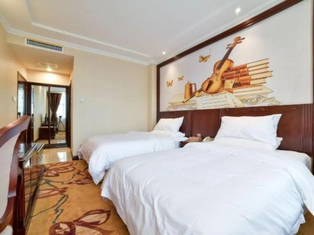 Bed in Vienna Classic Hotel Zhangzhou Longchi Center