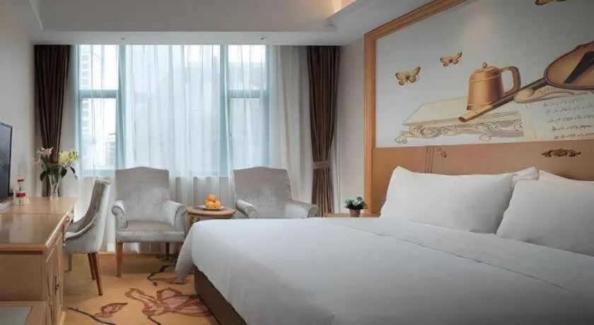 Bed in Vienna Classic Hotel Zhangzhou Longchi Center