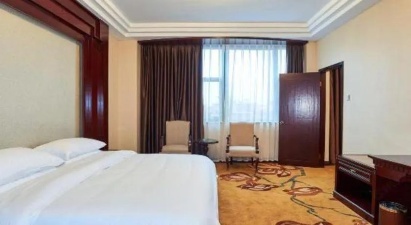 Bed in Vienna Classic Hotel Zhangzhou Longchi Center