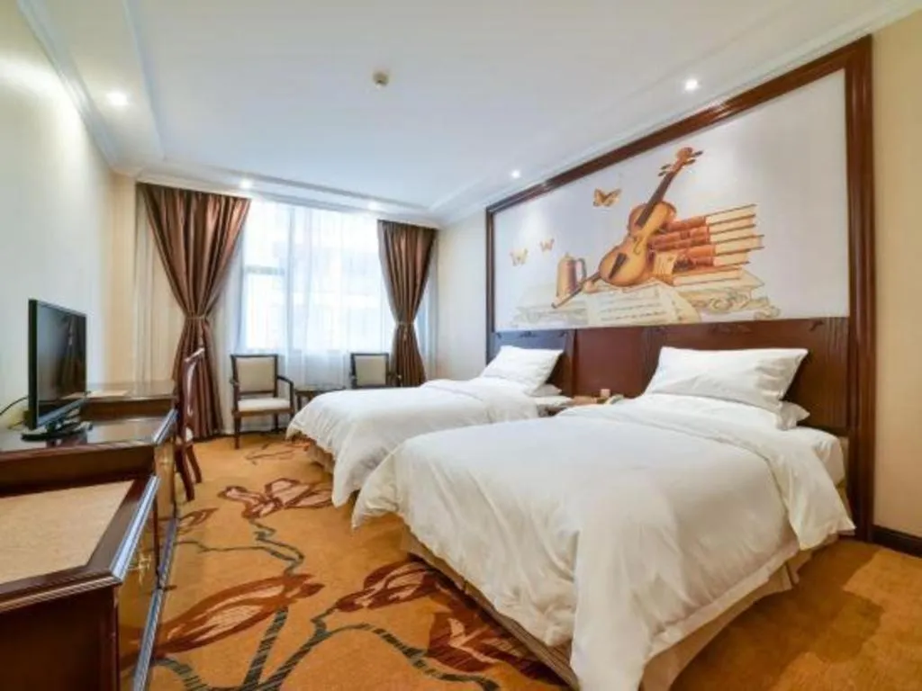 Bed in Vienna Classic Hotel Zhangzhou Longchi Center