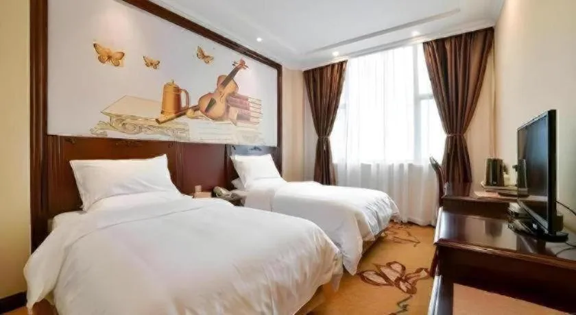Bed in Vienna Classic Hotel Zhangzhou Longchi Center