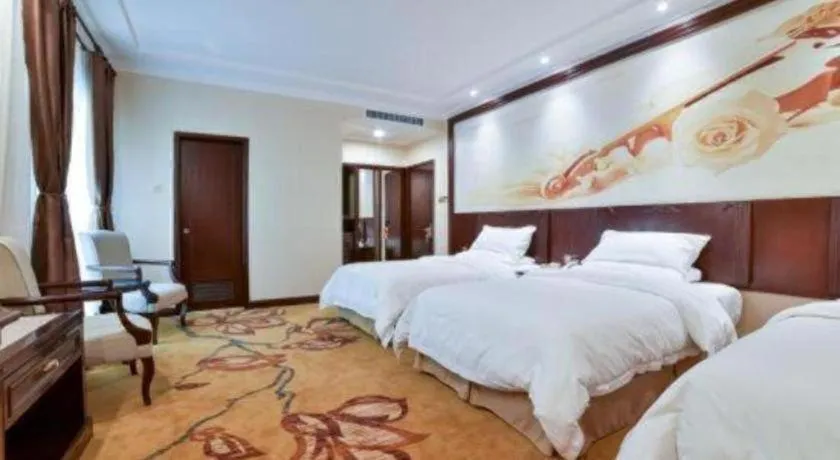 Bed in Vienna Classic Hotel Zhangzhou Longchi Center