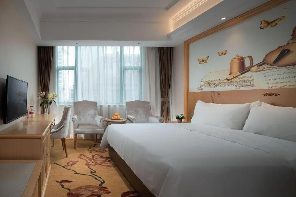 Bed in Vienna Classic Hotel Zhangzhou Longchi Center