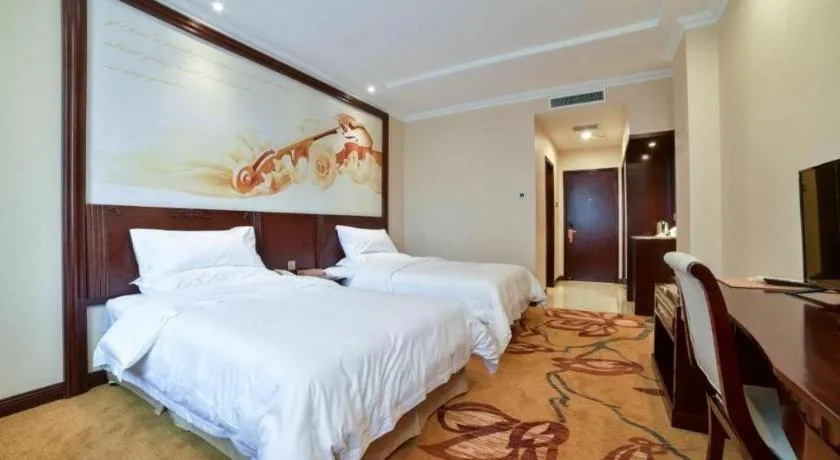 Bed in Vienna Classic Hotel Zhangzhou Longchi Center