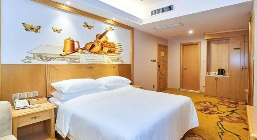 Bed in Vienna Classic Hotel Zhangzhou Longchi Center