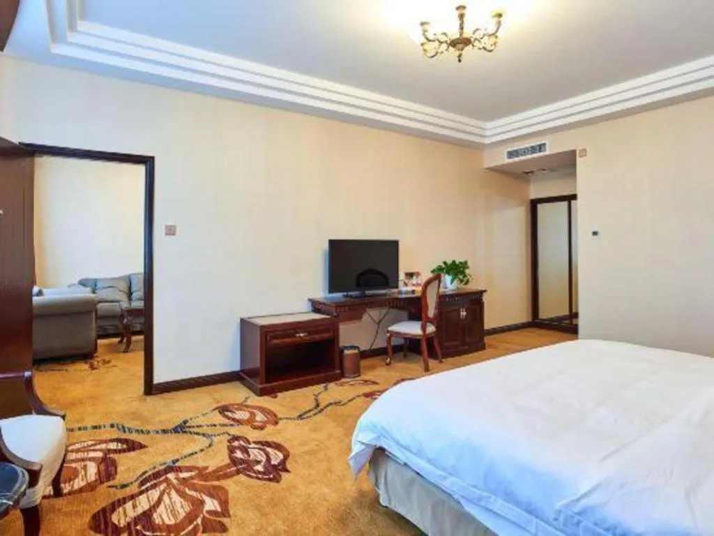 Bed in Vienna Classic Hotel Zhangzhou Longchi Center