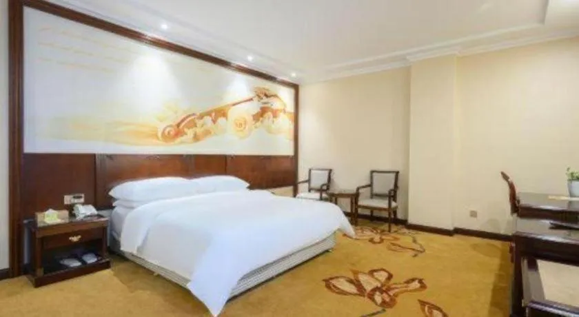 Bed in Vienna Classic Hotel Zhangzhou Longchi Center