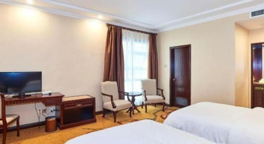 Bed in Vienna Classic Hotel Zhangzhou Longchi Center