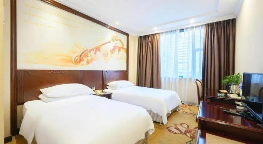 Bed in Vienna Classic Hotel Zhangzhou Longchi Center