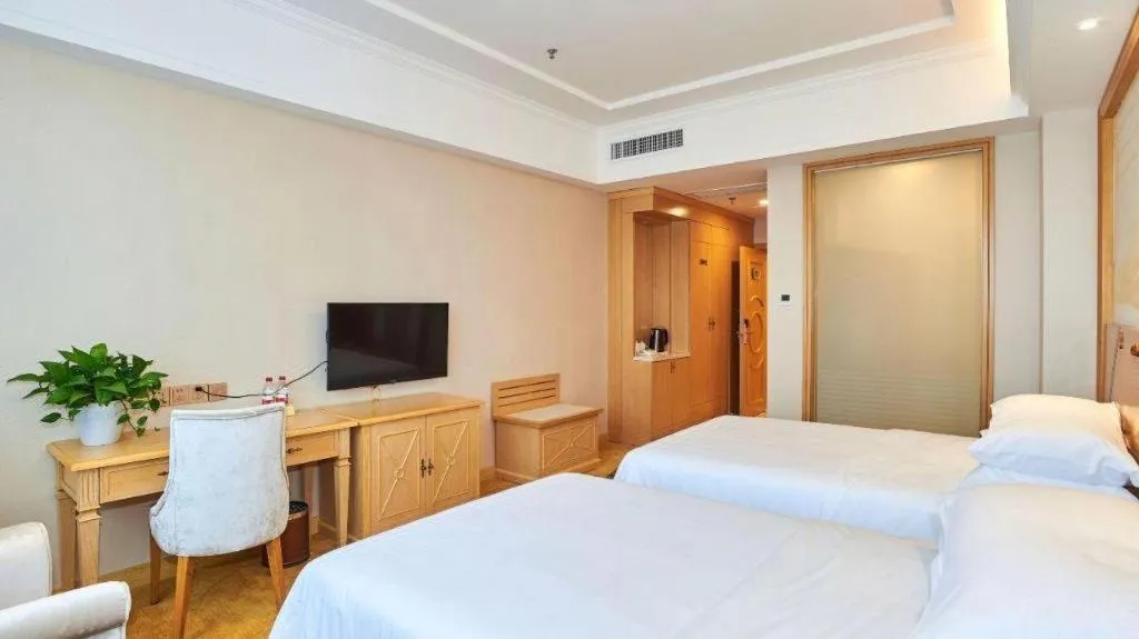 Bed in Vienna Classic Hotel Zhangzhou Longchi Center