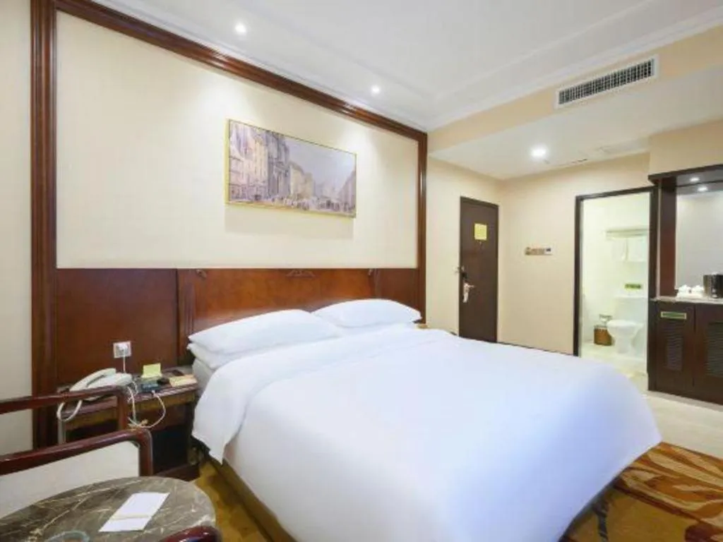 Bed in Vienna Classic Hotel Zhangzhou Longchi Center