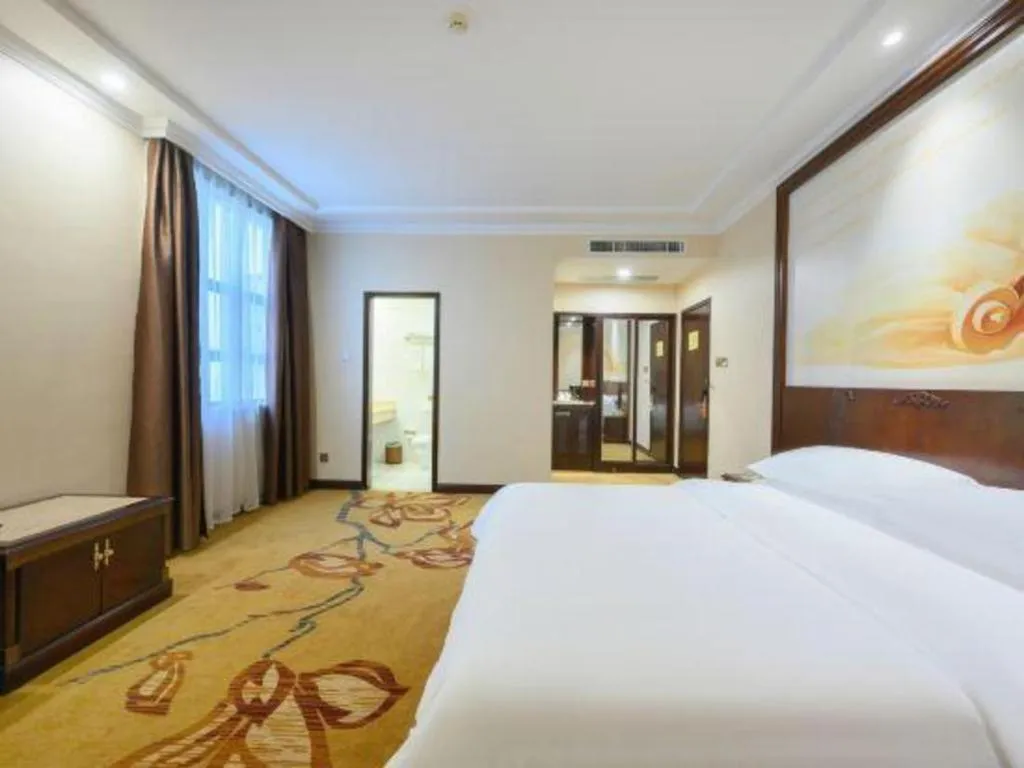 Bed in Vienna Classic Hotel Zhangzhou Longchi Center