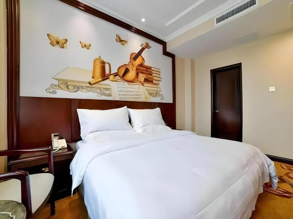 Bed in Vienna Classic Hotel Zhangzhou Longchi Center