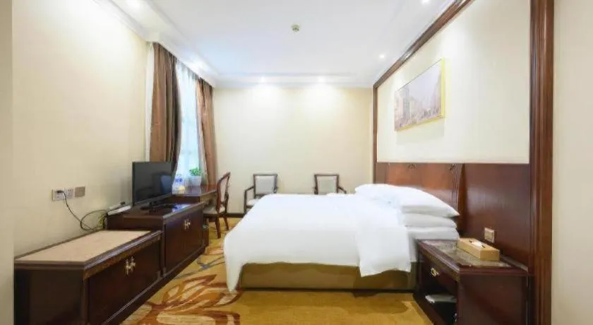 Bed in Vienna Classic Hotel Zhangzhou Longchi Center