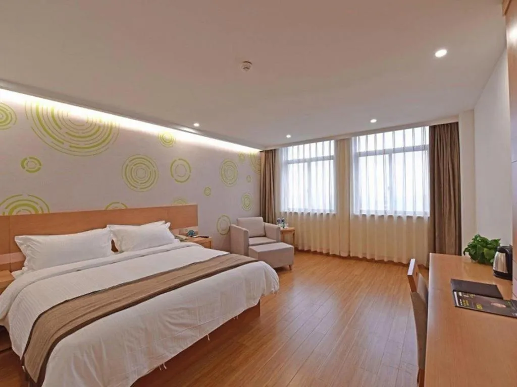 Bed in GreenTree Inn Tongxiang Chongfuzhen World Fur Center Branch