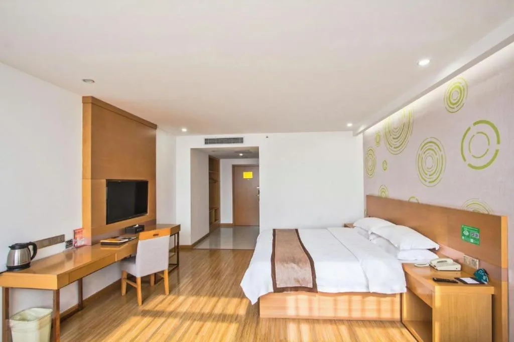 Bed in GreenTree Inn Tongxiang Chongfuzhen World Fur Center Branch