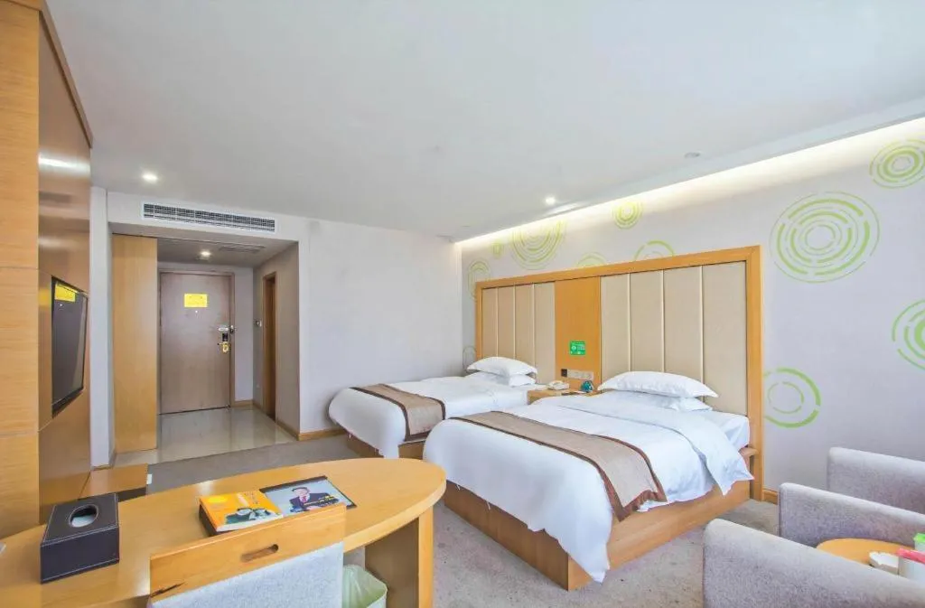 Bed in GreenTree Inn Tongxiang Chongfuzhen World Fur Center Branch