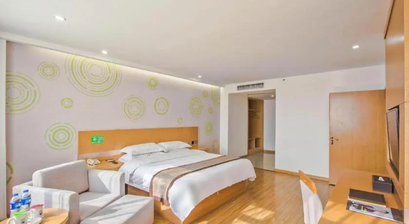 Bed in GreenTree Inn Tongxiang Chongfuzhen World Fur Center Branch