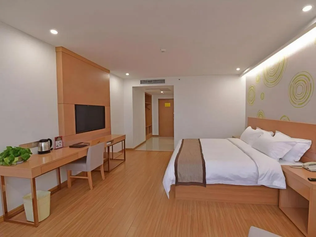 Bed in GreenTree Inn Tongxiang Chongfuzhen World Fur Center Branch