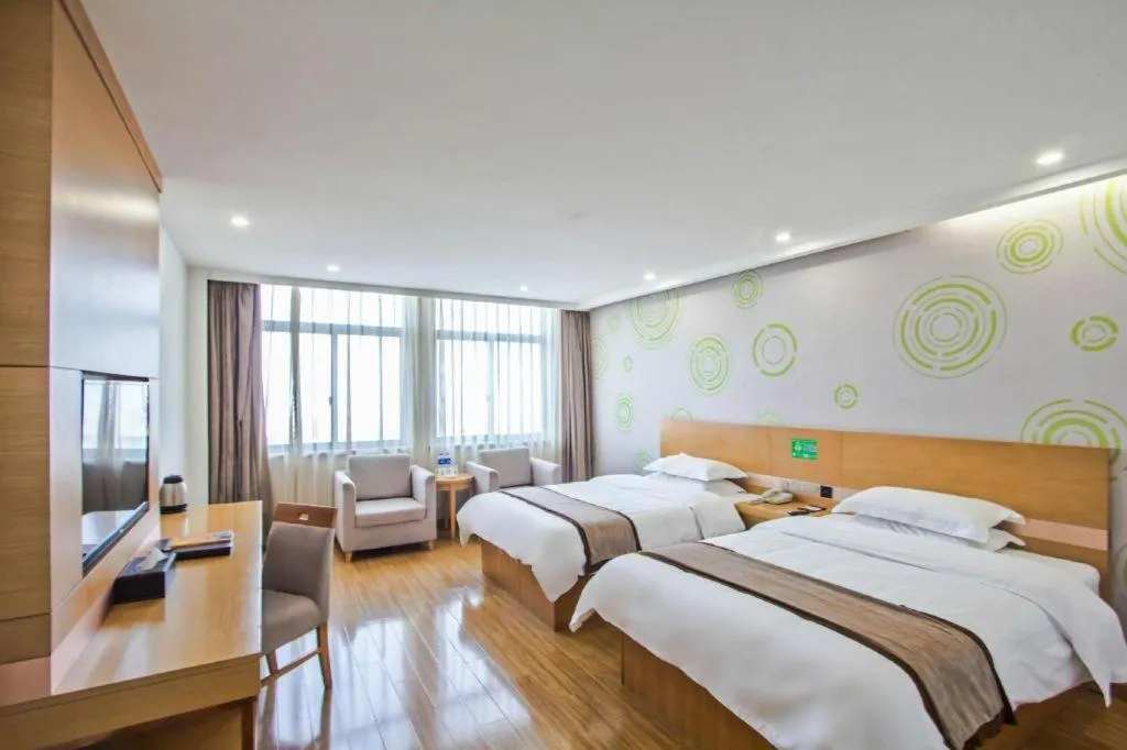 Bed in GreenTree Inn Tongxiang Chongfuzhen World Fur Center Branch