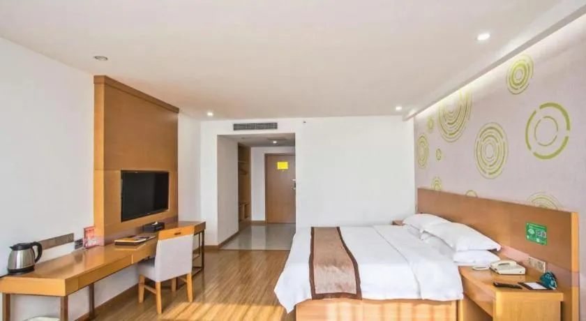 Bed in GreenTree Inn Tongxiang Chongfuzhen World Fur Center Branch