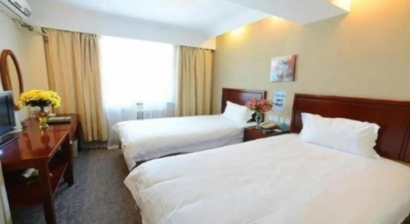 Bed in GreenTree Inn Tongxiang Chongfuzhen World Fur Center Branch
