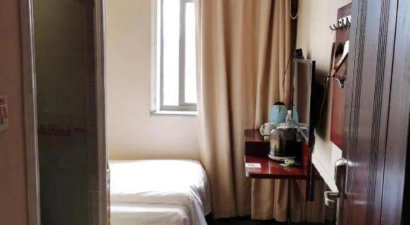 Bed in Shell Hotel Shanghai Baoshan Meilanhu Luosheng Road