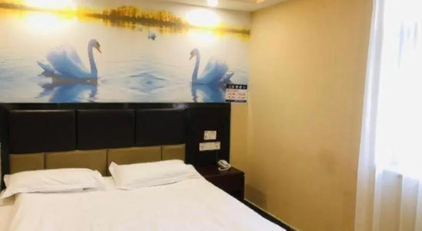 Bed in Shell Hotel Shanghai Baoshan Meilanhu Luosheng Road