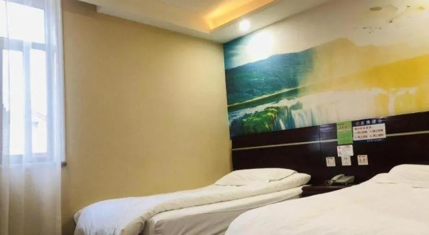 Bed in Shell Hotel Shanghai Baoshan Meilanhu Luosheng Road