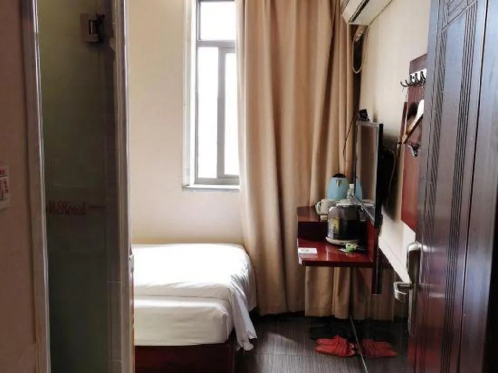 Bed in Shell Hotel Shanghai Baoshan Meilanhu Luosheng Road