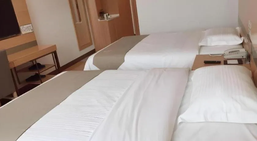 Bed in GreenTree Inn Hefei Changfeng County Gangji Town Jingang Avenue Express Hotel