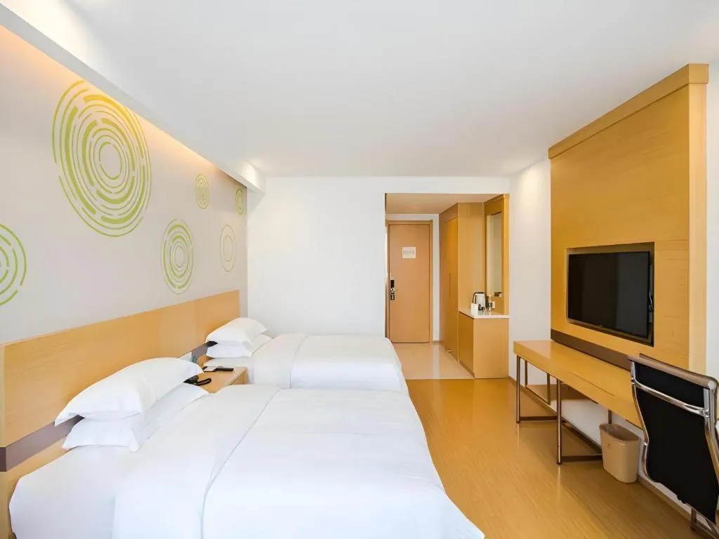 Bed in GreenTree Inn Jiaxing Qixing Town Goverment