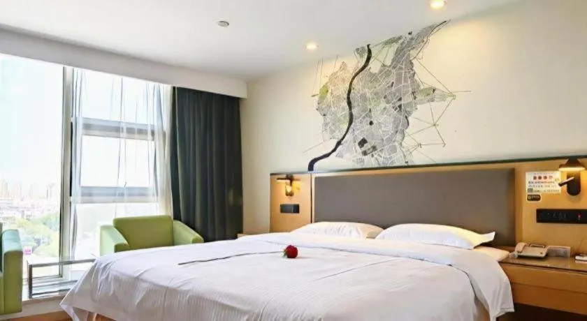 Bed in Vatica Hefei Feidong County Yuzhou Central Square Hotel