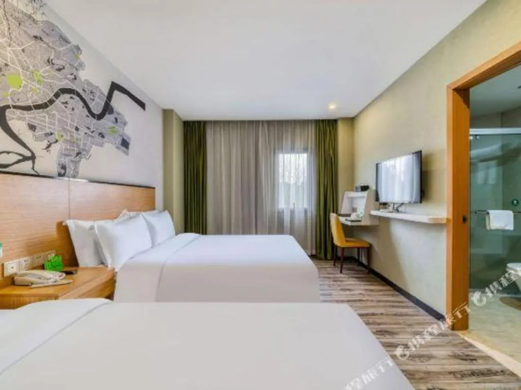 Bed in Vatica Hangzhou Xiasha Media College Hotel