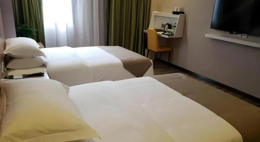 Bed in Vatica Hangzhou Xiasha Media College Hotel