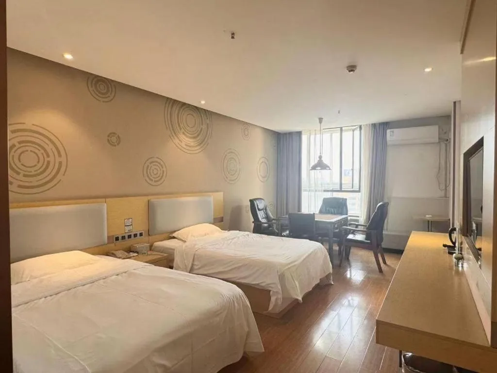 Bed in GreenTree Inn Huanggang City Wuxue City Kanjiang Avenue