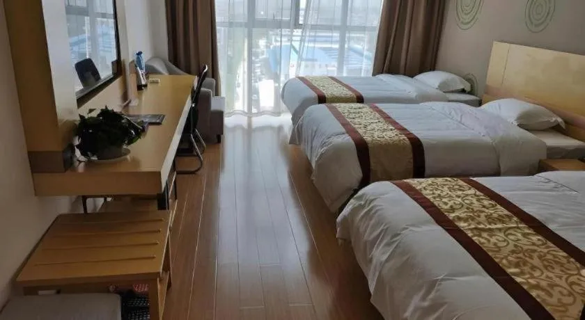 Bed in GreenTree Inn Huanggang City Wuxue City Kanjiang Avenue