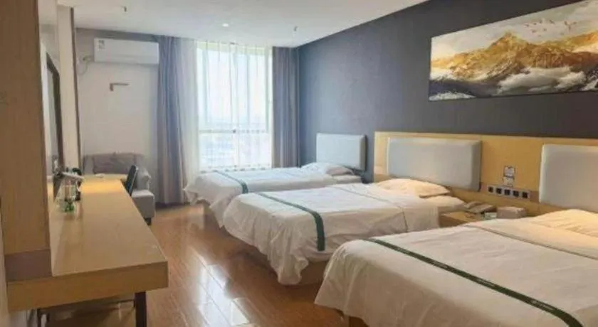 Bed in GreenTree Inn Huanggang City Wuxue City Kanjiang Avenue