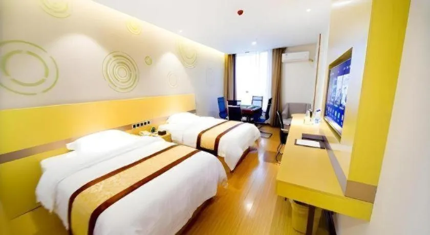 Bed in GreenTree Inn Huanggang City Wuxue City Kanjiang Avenue