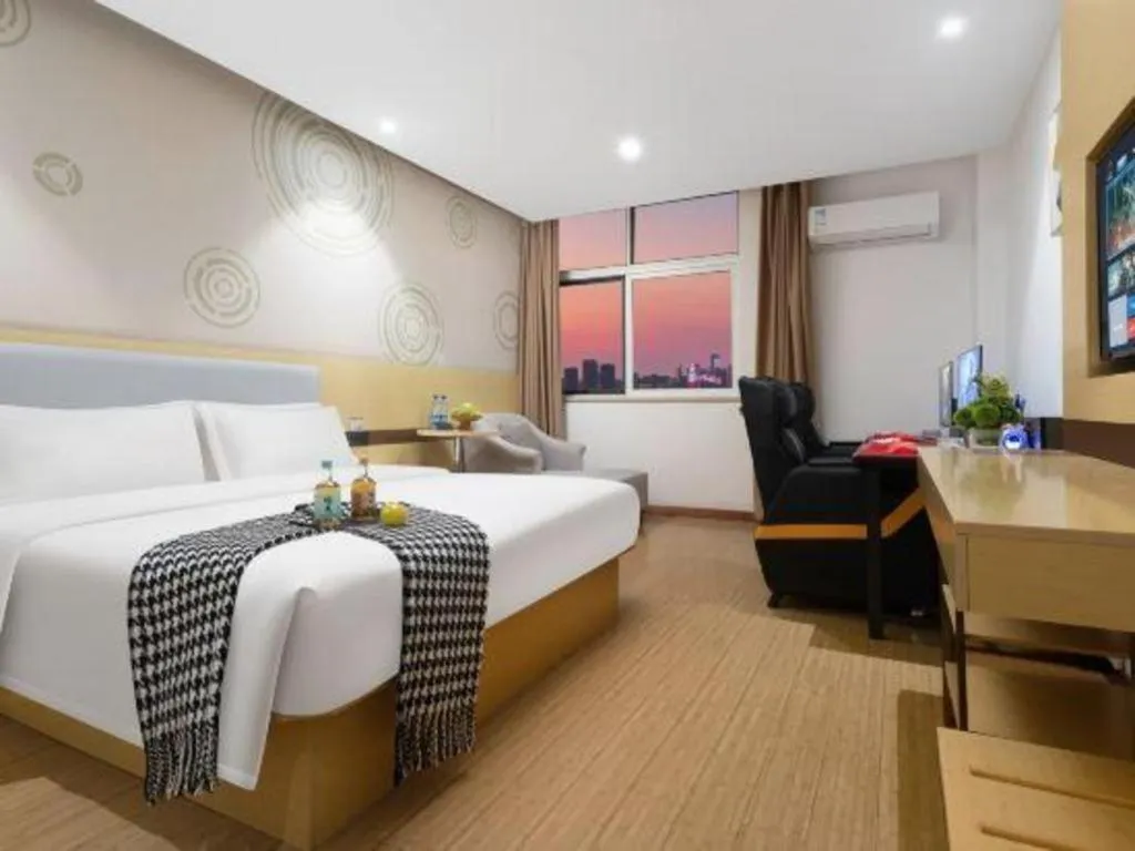 Bed in GreenTree Inn Huanggang City Wuxue City Kanjiang Avenue