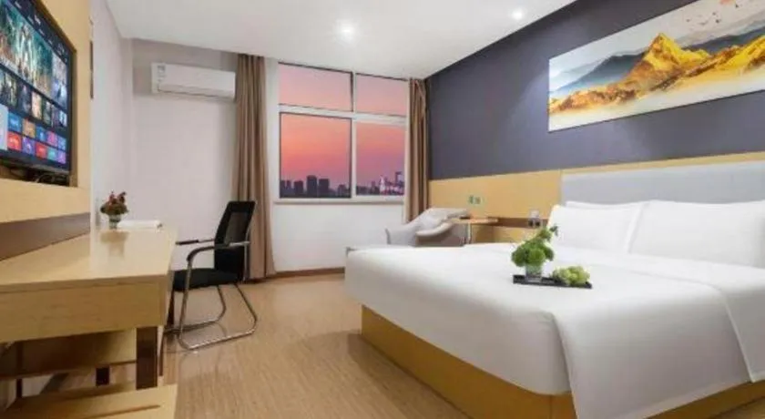 Bed in GreenTree Inn Huanggang City Wuxue City Kanjiang Avenue