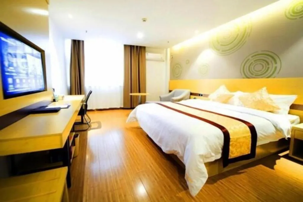 Bed in GreenTree Inn Huanggang City Wuxue City Kanjiang Avenue