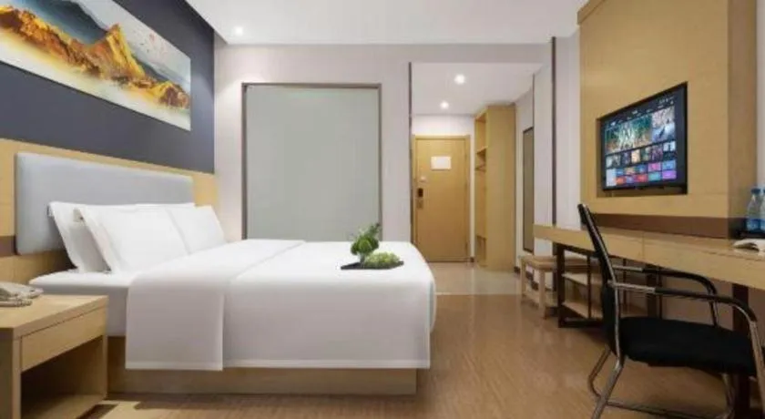 Bed in GreenTree Inn Huanggang City Wuxue City Kanjiang Avenue