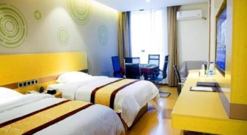Bed in GreenTree Inn Huanggang City Wuxue City Kanjiang Avenue