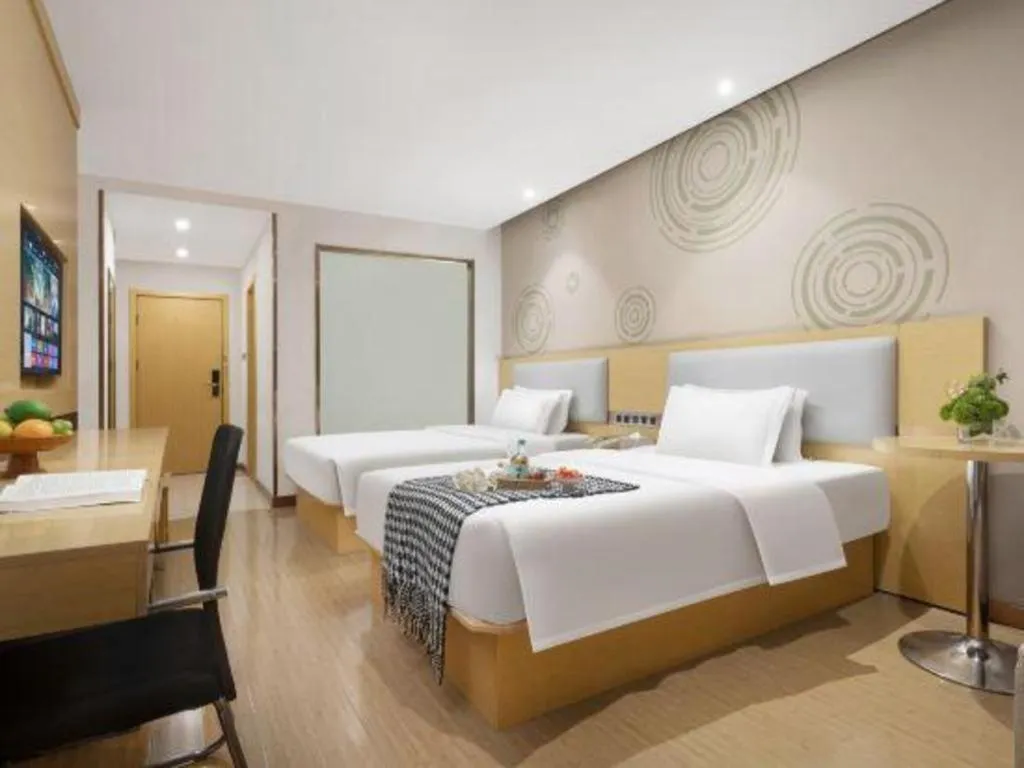 Bed in GreenTree Inn Huanggang City Wuxue City Kanjiang Avenue